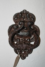 T&uuml;rklopfer aus Gu&szlig;eisen, 17 x 11 cm, Tiefe 3,5 cm, dunkelbraun