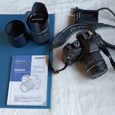 OLYMPUS E-420 Digital SLR Camera with accessories: interchangeable lens,