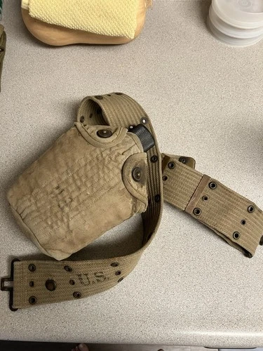 1945 World War 2 US Military Canteen, Cover, And Belt .  1938 Leggings