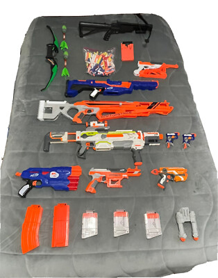 Nerf Guns (9) and 2 extra toy guns. Bag of Soft bullets aswell. Great condition!