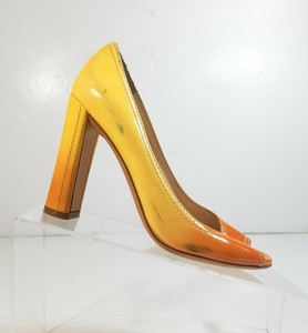 orange prada heels