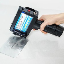 Handheld Inkjet Printer Prints Production Date and Production Code and Barcode