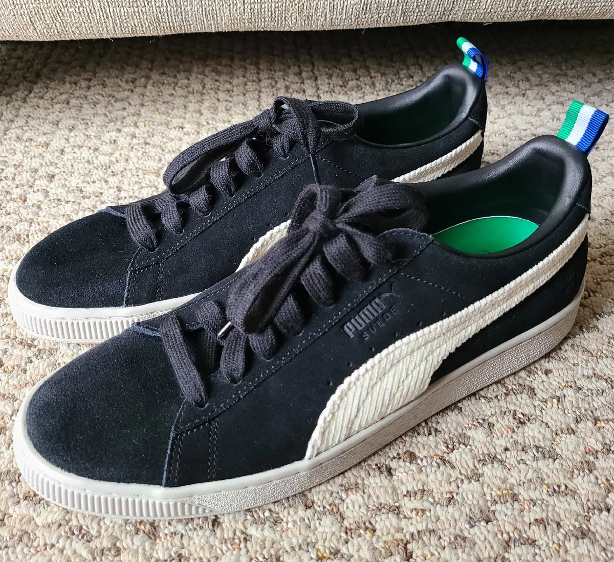 Puma suede black hotsell with white laces