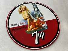 12 Drink 7up Soda Pop PORCELAIN ENAMEL SIGN pinup Girl