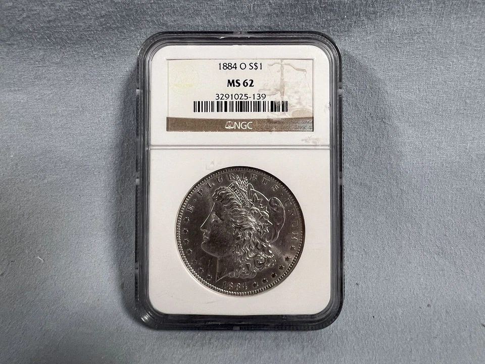 Hermosa moneda Morgan NGC MS62 1884-O $1