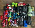 Various model cars, monster trucks, and hot wheels lots of vintage toys