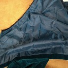 Blue velvet Doncaster blazer with satin-lined pockets and smooth fabric, showing inner dark blue cotton USA made tag.