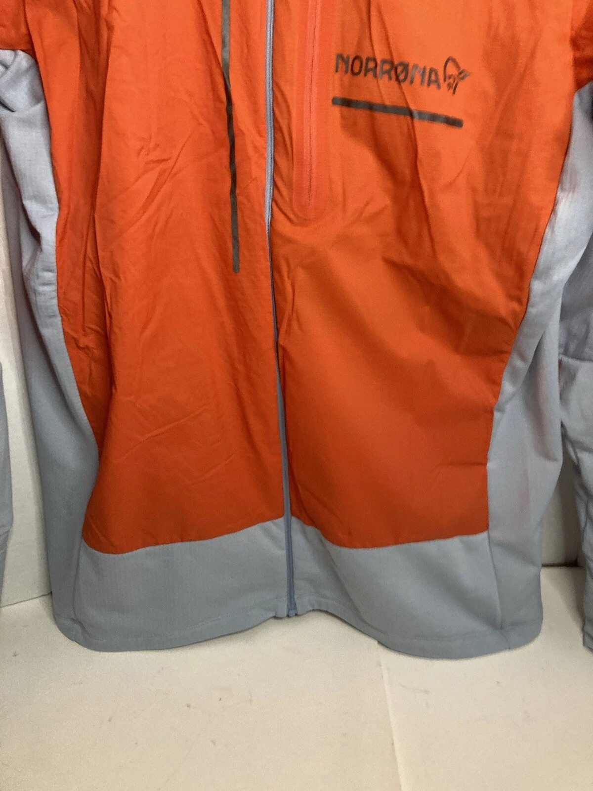 norrona senja alpha90 zip hooded light orange jacket