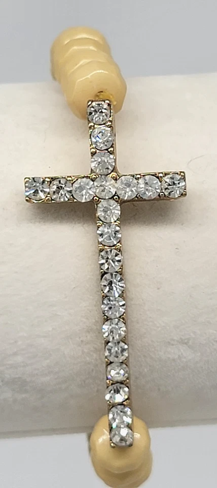 Pulsera elástica con cuentas cruzadas de diamantes de imitación beige acrílico tono dorado metal religioso Foto 4 de 4