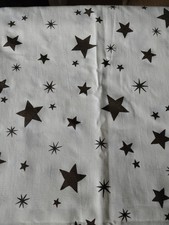 tablecloth 60 X 80 cream color with brown stars