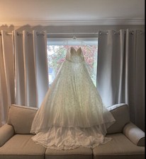 wedding dress size 14, unaltered never worn