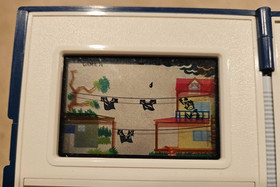 NINTENDO RAIN SHOWER Game and Watch vintage electronic handheld LCD game 1983