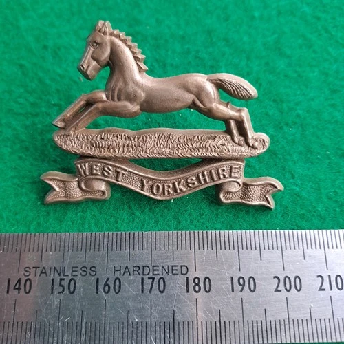 WW2 West Yorkshire Regiment Plastic Economy Cap Badge