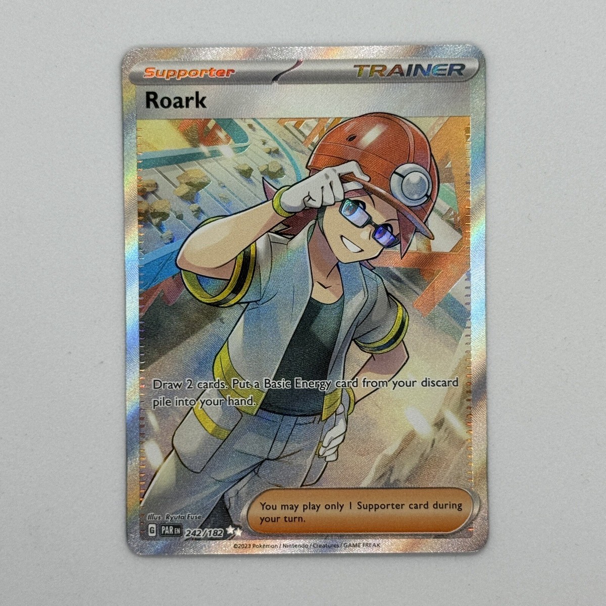 Roark 242/182 Ultra Rare Full Art Holo Paradox Rift NM Pokemon