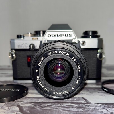 OLYMPUS OM10 SLR Film Camera w/ S ZUIKO AUTO-Zoom 35-70mm F3