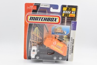 Matchbox Working Rigs 2009 Autocar ACX Garbage Truck. Blister Karte PP Sample