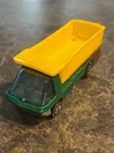 Hot Wheels Redline Heavyweights 1969 Green Dump Truck (HK) Dark Int, Badge