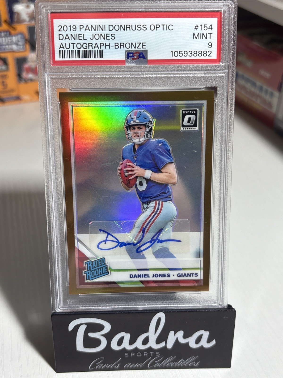 2019 Donruss Optic #154 Daniel Jones - (RC) Rated Rookie Bronze Auto Prizm PSA 9