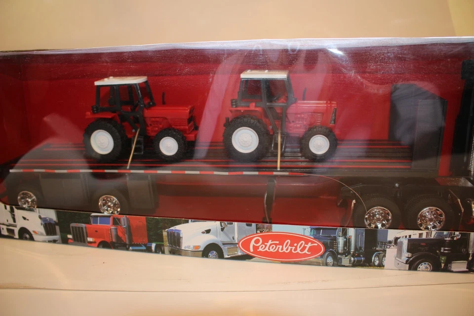 New Ray Peterbilt Flatbed Semi with Farm Tractor Load 1/32 Scale Boxed - Image 4 of 4
