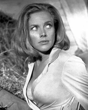 Honor Blackman shows off her cleavage as Pussy Galore in Goldfinger 16x20 poster
