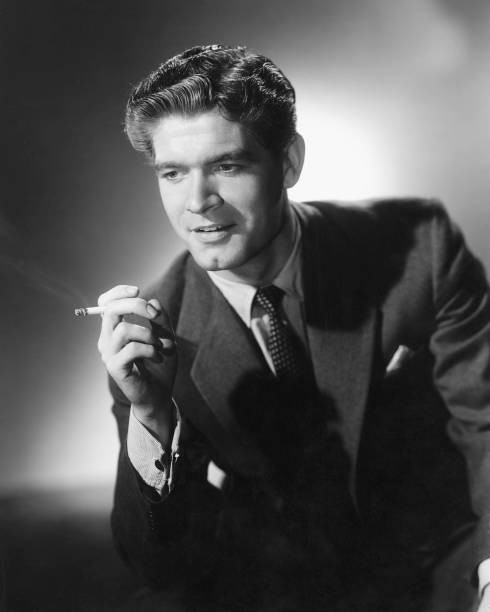 Irish actor Stephen Boyd poses with a cigarette circa 1960 Old Photo