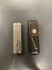 Vintage circa 1991 Leatherman PST with leather belt pouch, multi-tool
