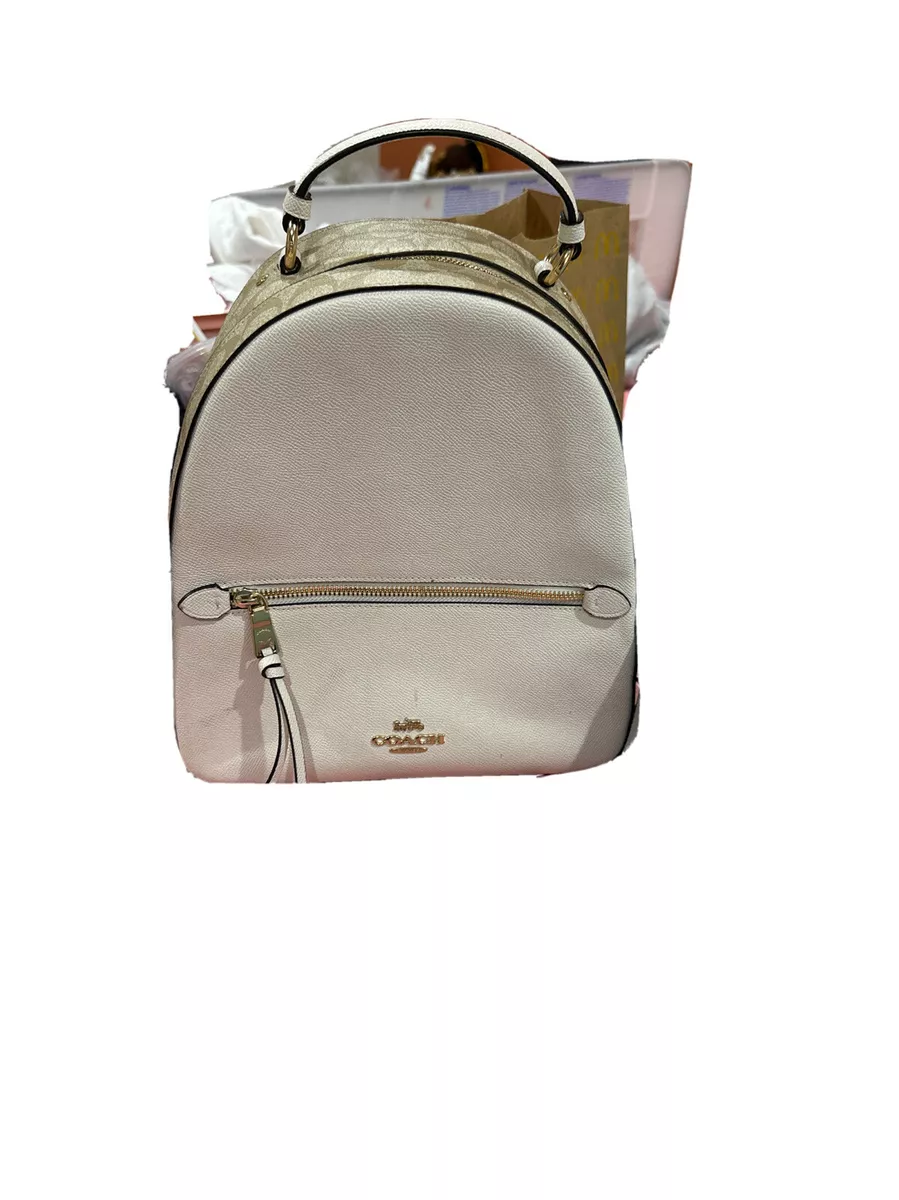 Creme colored womens coach backpack. Good condition. Used