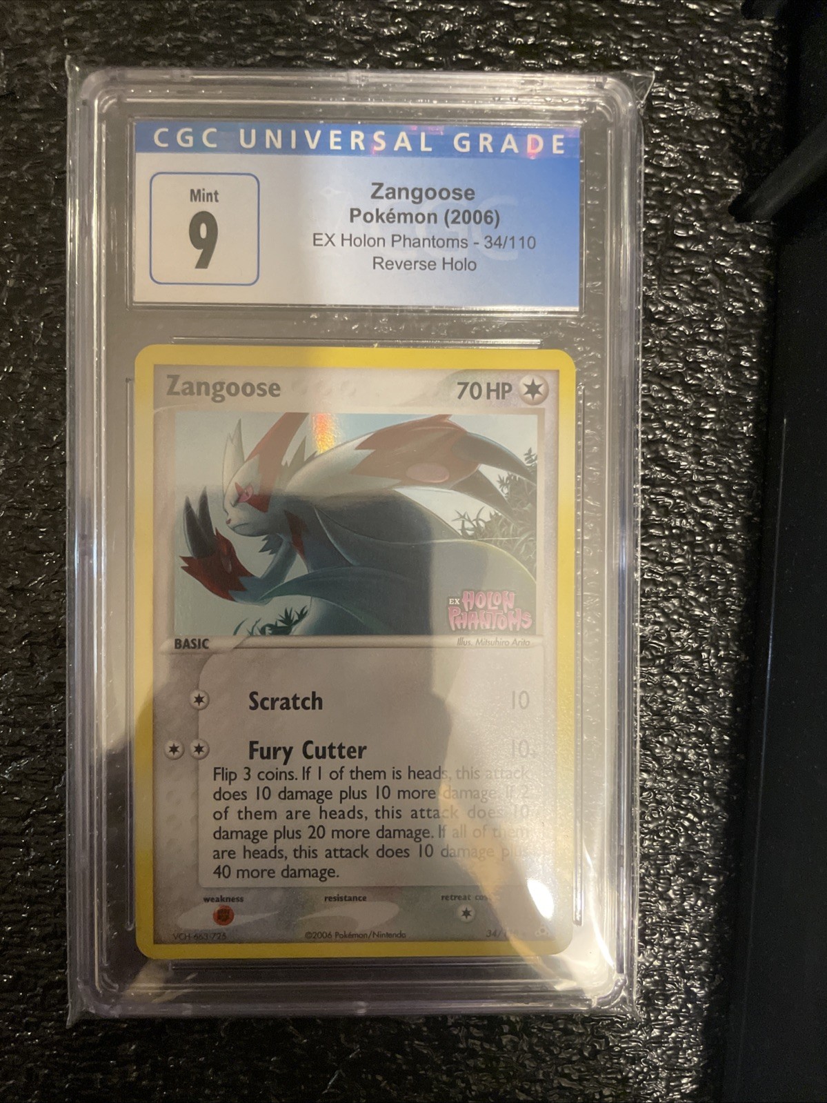 Zangoose 34/110 Holon Phantoms Reverse Holo Stamped CGC 9 Blue Label