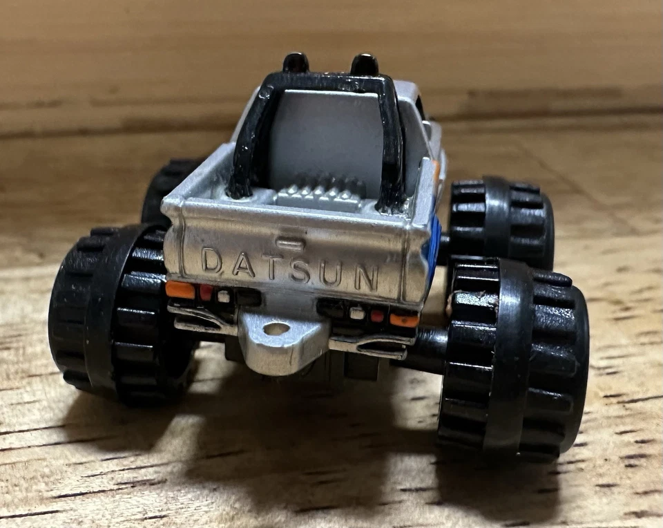 Vintage Micro Machines Datsun Pickup 4x4 Monster Truck 1.25" Scale Model Silver - Image 3 of 4