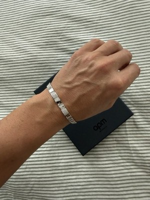 APM Monaco Roman Numeral Bracelet in a sleek silver-tone finish NEW M Size