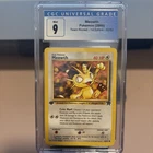 CGC 9 MINT Meowth 2000 Team Rocket 1st Edition 62/82 Pokemon Card