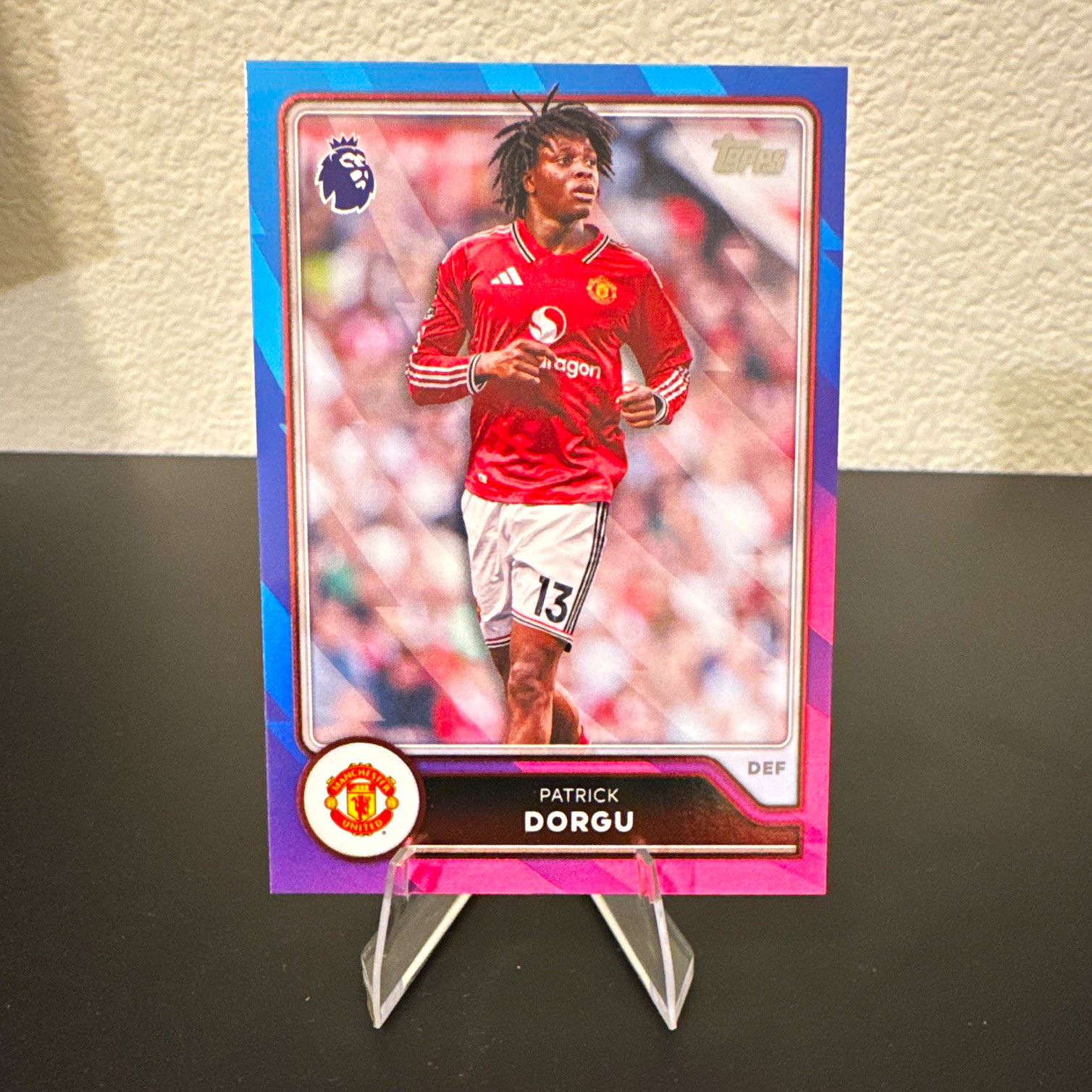 Topps Premier League 2026/27 Patrick Dorgu Man U Blue/Pink Voltage Parallel #193