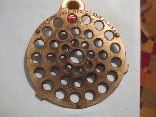 THE Griswold MFG.CO.No.8 Cast iron Trivet (206)