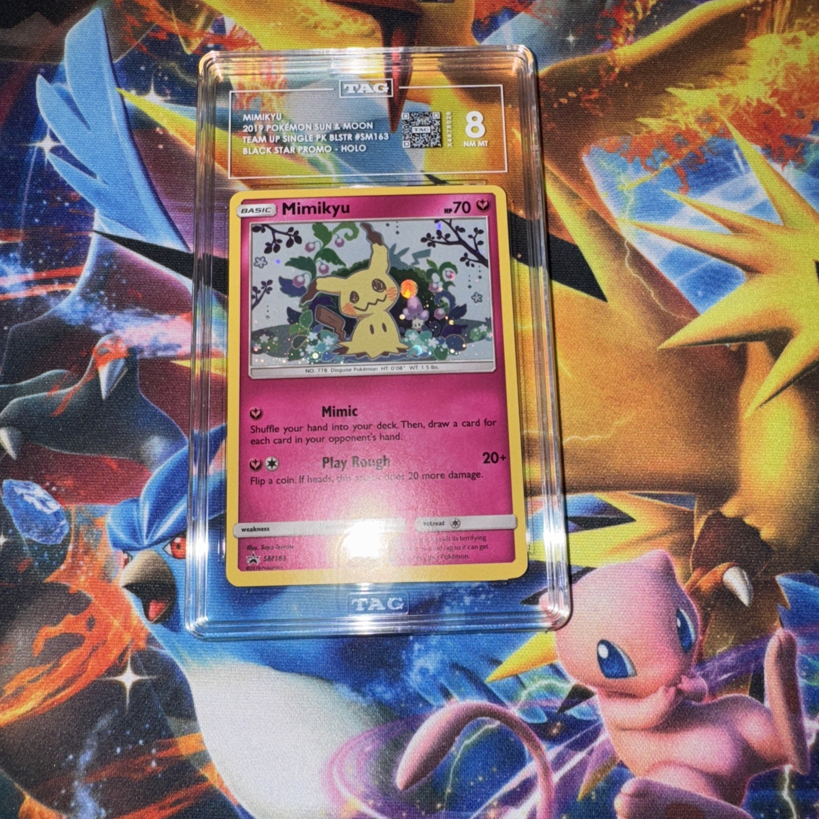 Pokemon Holo Mimikyu 2019 Black Star Promo SM163 TAG 8