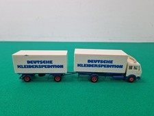 HERPA 1:87 HO Gauge Mercedes-Benz Deutsche Kleiderspedition Truck & Trailer
