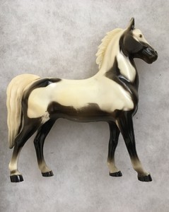 white plastic horse