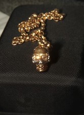 Collana Alexander McQueen testa di teschio cristallo ottone oro swarovski