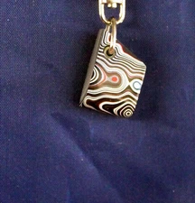 Fordite Keychain - 26.93mm x 17.66mm x 7.18mm     (3159)
