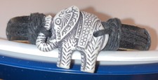 carved elephant on leather band bracelet