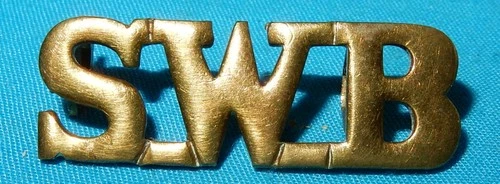GENUINE WW1 ERA SWB SOUTH WALES BORDERERS REGIMENT SHOULDER TITLE BADGE