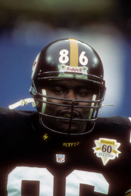 Tight End Eric Green of the Pittsburgh Steelers follows the action- Old Photo