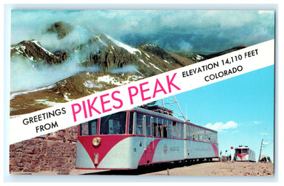 Postcard CO Pikes Peak Greetings Dual View Cog Railway Cars Clouds Over Mountain
