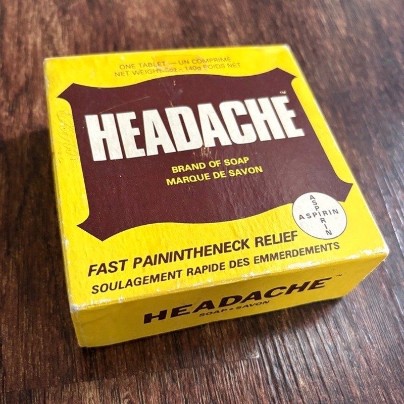 Novelty bar soap shaped and branded like aspirin tablets — clever retro advertising aesthetic that works as a gag gift or actual bathroom decor.
