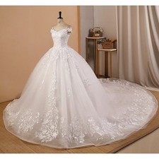 Off the shoulder ballgown wedding dress with lace and long train