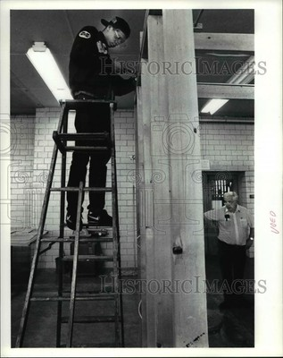 #ad #ad 1991 Press Photo Jason Anderson works stop a ladder putting in wiring for the $24.99