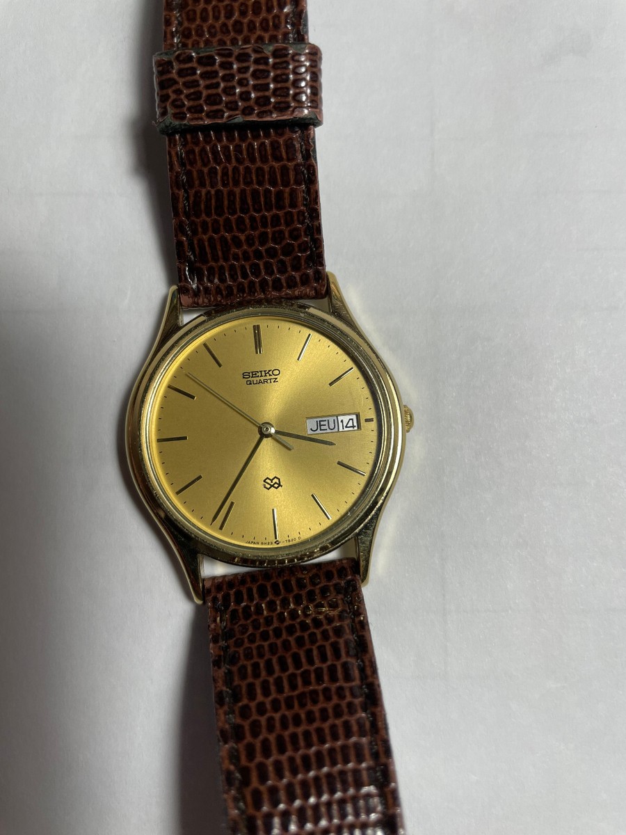 Seiko Dress Month/Day Gold Face Watch- 5H23-7B00