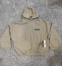 Fear of God Essentials Hoodie in the Desert Sand colorway. Never worn.