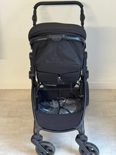 Pushchair Strollers withNew Rain Cover and baby bag.