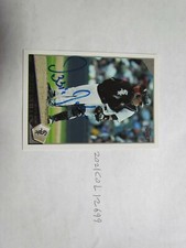 2009 Topps Ozzie Guillen Signed Baseball Card Beckett Pre-Certified 