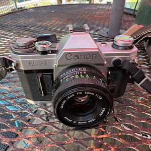 Canon AE-1 SLR Film Camera Black Silver with FD 50mm 1:1.8 Lens Made in Japan